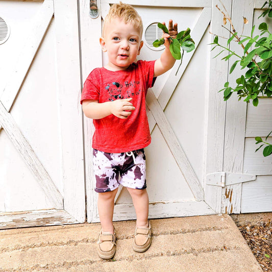 Cow Print Swim Trunks